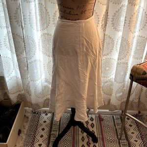 White fully lined gently used BoHo hippie skirt.